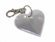 Pehmoheijastin sydän valkoinen papukaijalukkokiinnitys